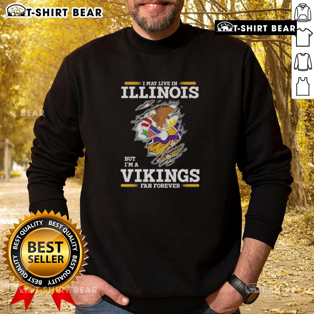 Cozy sweatshirt featuring 'I May Live In Illinois But I'm A Minnesota Vikings Fan Forever' design for dedicated fans.