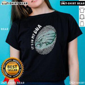 Original Philadelphia Eagles 'It's In My DNA' ladies tee featuring team colors and logo, perfect for fans.