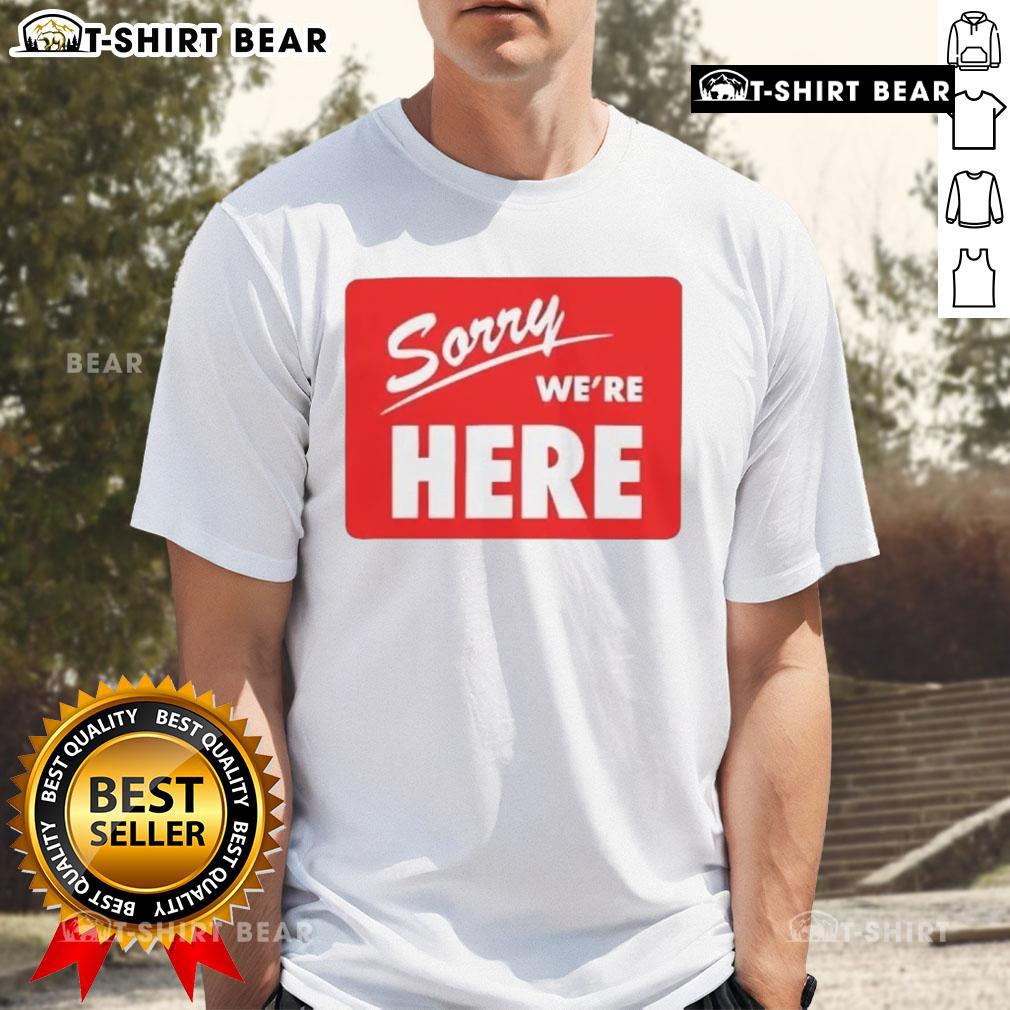 Original Sorry We're Here T-Shirt featuring bold text design, perfect for casual wear and statement fashion.