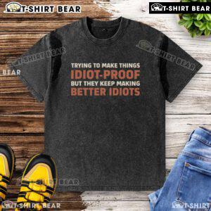 Casual Pretty Idiot-Proof Paradox Washed T-Shirt displayed on a wooden background, showcasing its unique design and color.