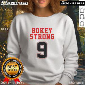 Alt Text: Comfortable Top Bokey Strong 9 Sweatshirt in stylish design, perfect for casual wear and workout sessions.