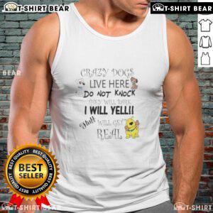 Top Crazy Dogs Live Here tank top with humorous warning about barking dogs and loud owner, perfect for dog lovers.