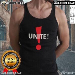 Dominic Fike wearing a stylish Unite tank top, showcasing his unique fashion sense and vibrant style.