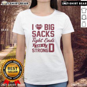 Alt Text: Top I Love Big Sacks Tight Ends And A Strong D Ladies Tee featuring a bold graphic design for football fans.