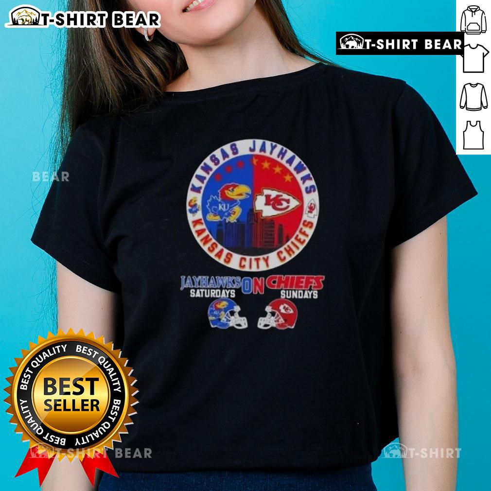 Top Kansas Sports tee featuring Jayhawks and Chiefs helmets, perfect for football fans on Saturdays and Sundays.