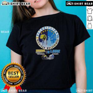 Michigan Wolverines and Detroit Lions helmets with city skyline on a ladies tee, perfect for game day style.
