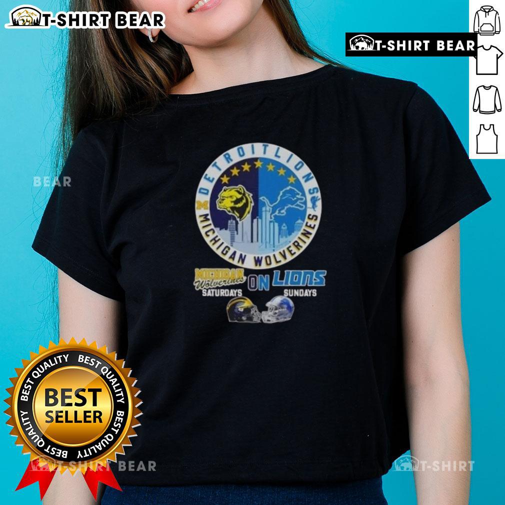 Michigan Wolverines and Detroit Lions helmets with city skyline on a ladies tee, perfect for game day style.