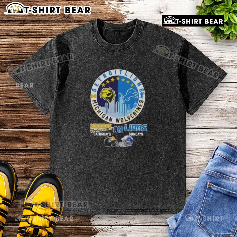 Alt Text: Top Michigan Wolverines Saturdays and Detroit Lions Sundays helmets on a skyline washed t-shirt design.