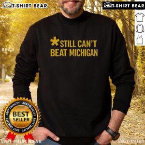 Top Still Can't Beat Michigan Sweatshirt in navy blue, featuring bold white lettering and a cozy design perfect for fans.
