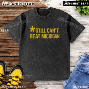 Top Still Can't Beat Michigan washed t-shirt in navy blue, perfect for fans celebrating their team spirit.