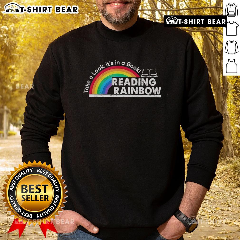 Cozy retro sweatshirt for book lovers featuring 'Top Take A Look It's In A Book' design, perfect for reading enthusiasts.