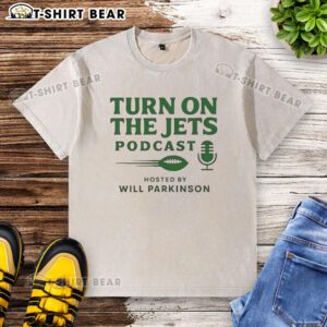 Awesome Turn On The Jets Podcast washed t-shirt featuring a stylish design, perfect for fans of the Jets and podcasts.