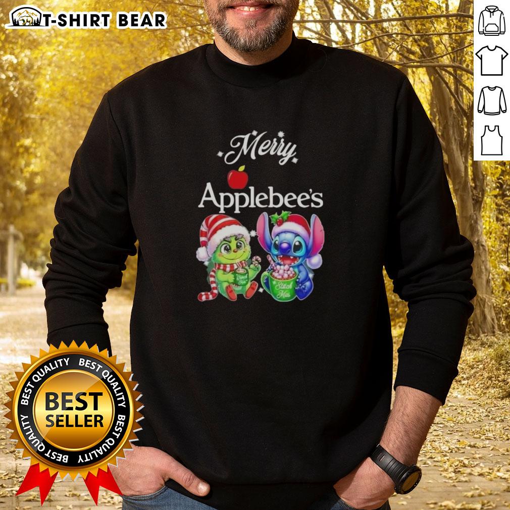 Alt Text: Cute Baby Grinch and Stitch in Applebee's Merry Christmas sweatshirt, celebrating festive holiday cheer.
