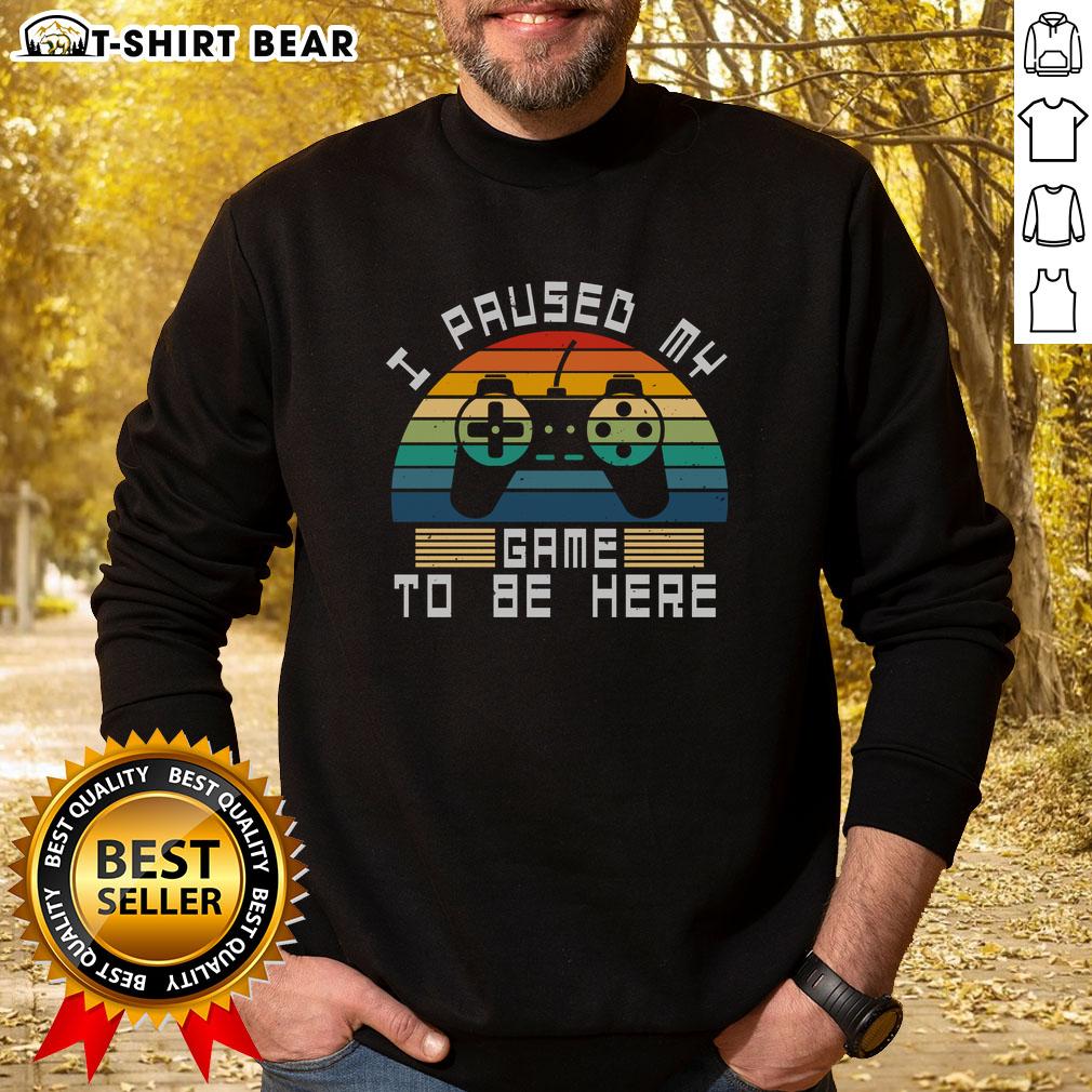Alt Text: Retro vintage gamer sweatshirt featuring I Paused My Game To Be Here design against a sunset background.
