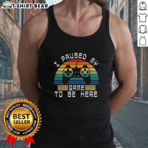 Alt Text: Funny I Paused My Game To Be Here retro vintage gamer tank top against a sunset backdrop, perfect for gaming enthusiasts.