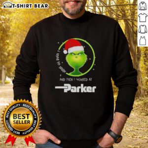 Cozy 'Good Grinch Christmas' sweatshirt featuring a humorous design about working at Parker Hannifin. Perfect for holiday cheer!
