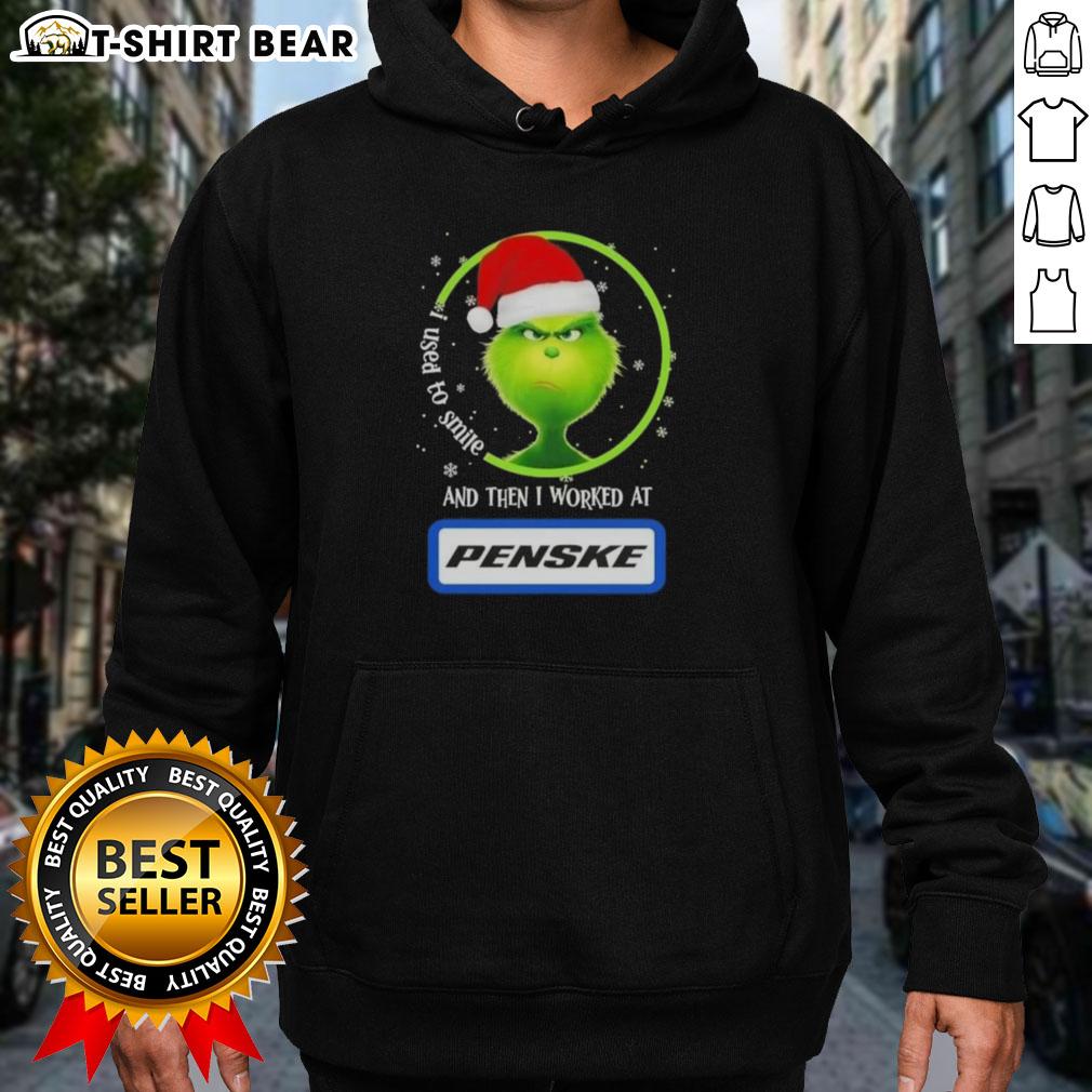 Good Grinch Christmas hoodie with 'I Used to Smile and Then I Worked at Penske Corporation' text, perfect for holiday cheer.