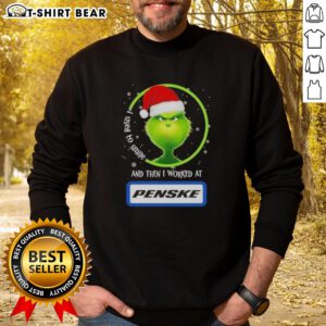 Alt Text: Good Grinch Christmas sweatshirt featuring 'I Used to Smile, Then I Worked at Penske Corporation' design.
