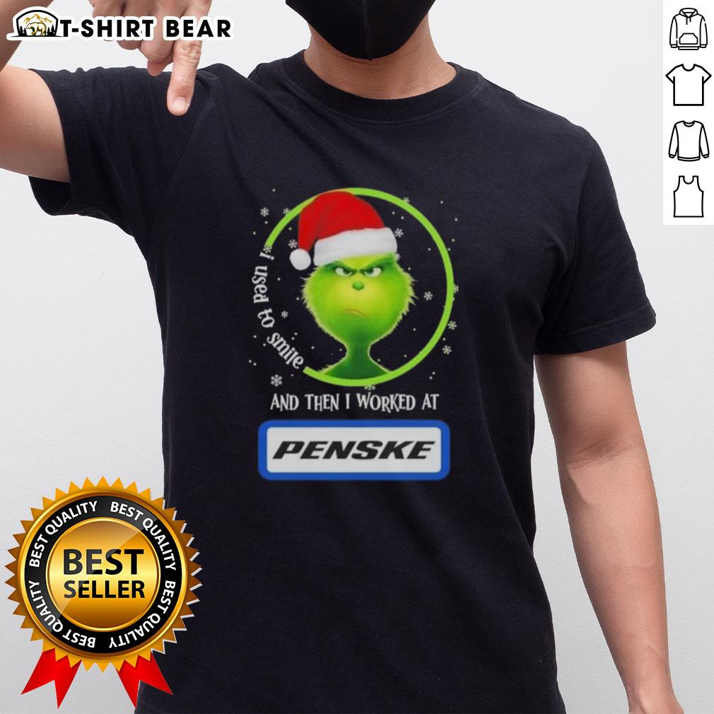 Good Grinch Christmas t-shirt featuring 'I Used To Smile And Then I Worked At Penske Corporation' design.