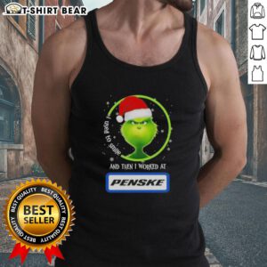 Good Grinch Christmas tank top featuring 'I Used to Smile, Then I Worked at Penske Corporation' design for festive humor.
