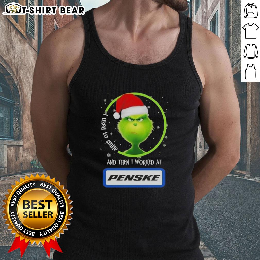 Good Grinch Christmas tank top featuring 'I Used to Smile, Then I Worked at Penske Corporation' design for festive humor.