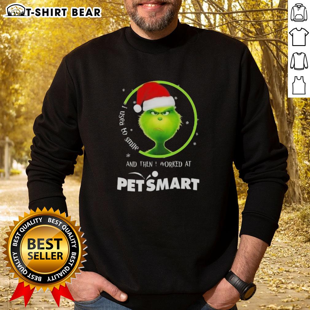 Good Grinch Christmas sweatshirt featuring 'I Used to Smile and Then I Worked at PetSmart' in festive design.
