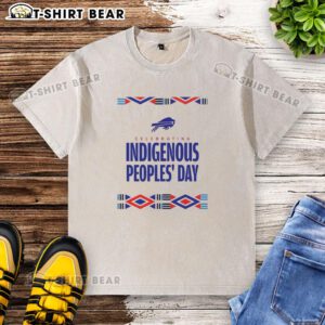 Happy Buffalo Bills fans celebrating Indigenous Peoples Day in a stylish washed t-shirt at a football game.