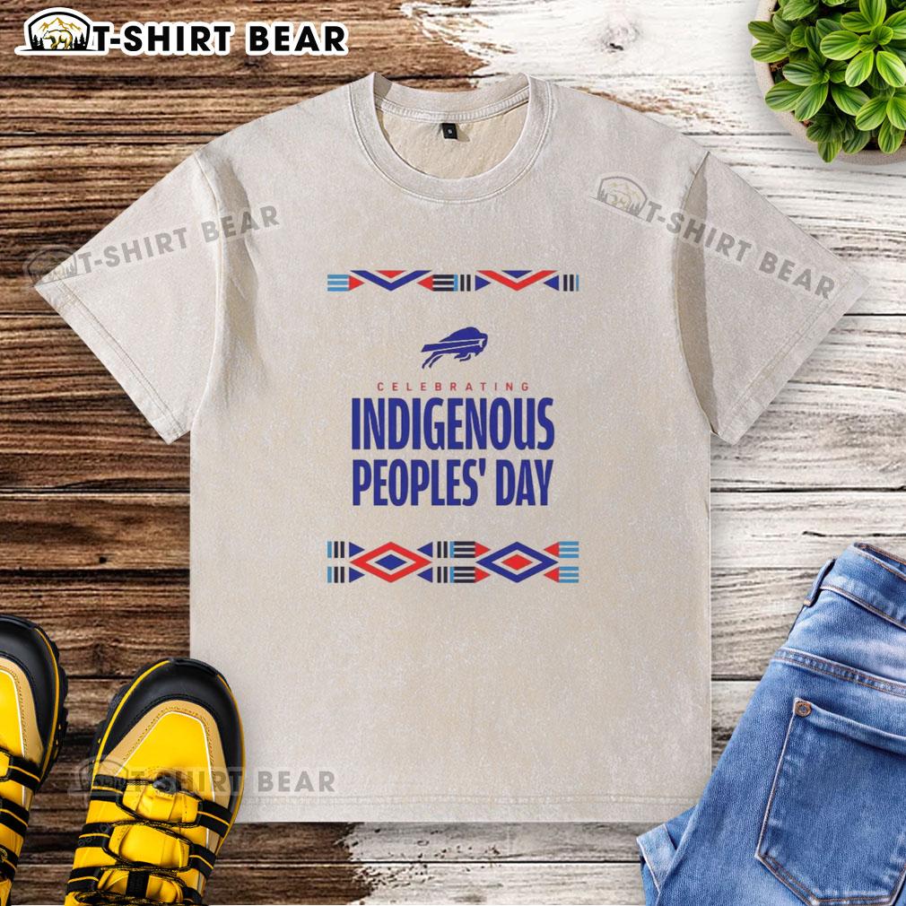 Happy Buffalo Bills fans celebrating Indigenous Peoples Day in a stylish washed t-shirt at a football game.