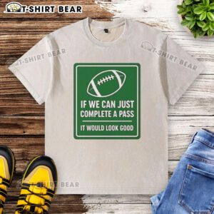 Football-themed washed t-shirt with 'Hot If We Can Complete A Pass' signboard design, perfect for sports enthusiasts.
