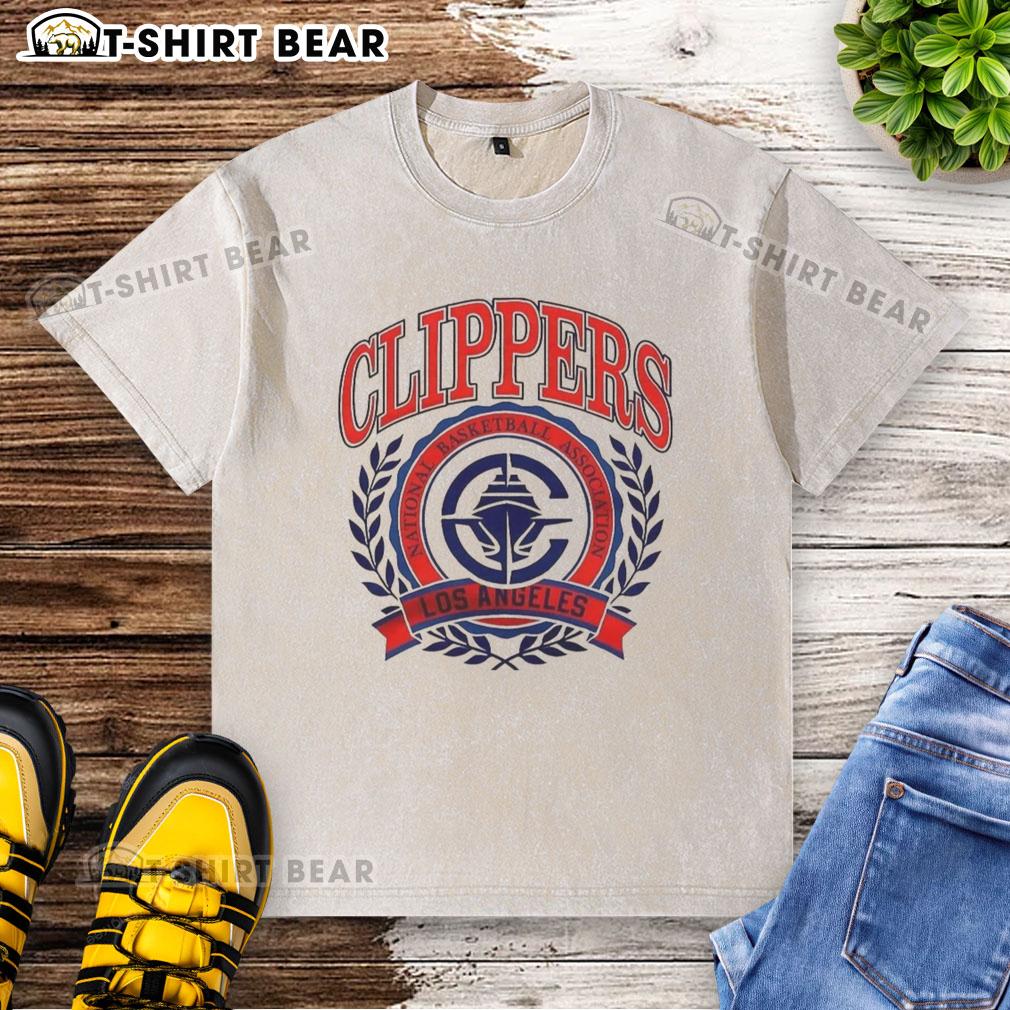 Vintage washed t-shirt featuring the Hot Los Angeles Clippers NBA logo in vibrant colors and classic design.