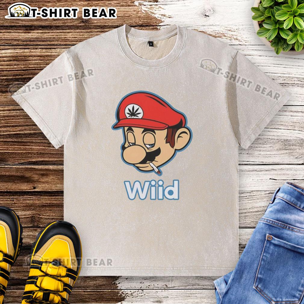 Hot Mario Bros Wii'd smoking washed t-shirt featuring vibrant graphics of Mario in a playful pose.