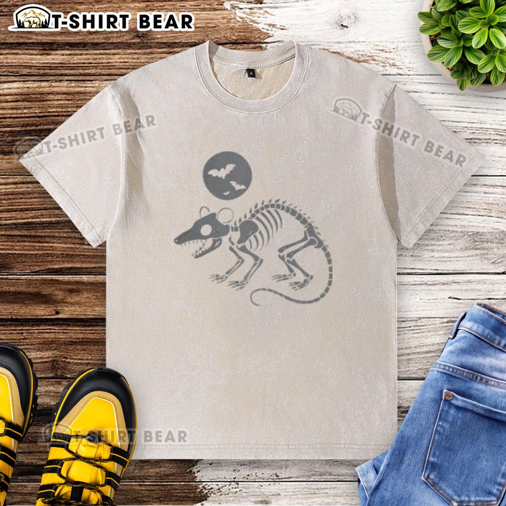 Cute opossum skeleton playing under a full moon with bats on a Halloween washed t-shirt design.