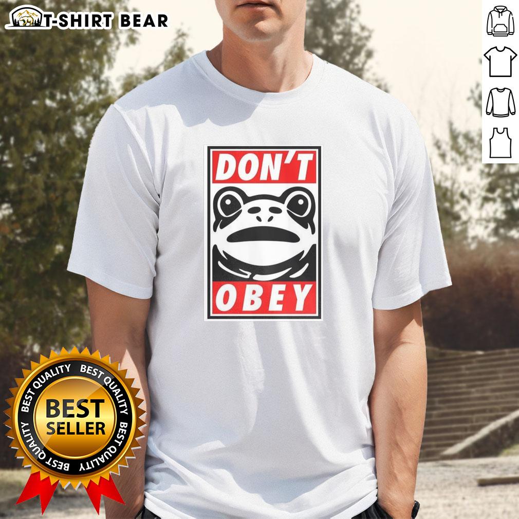 Nice Portland Frog Demands That You Don't Obey T-Shirt featuring a colorful frog graphic and catchy slogan.
