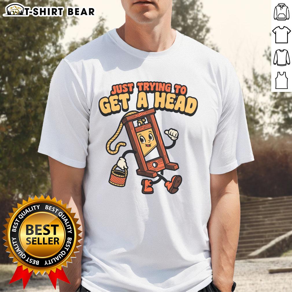 Alt Text: Official Just Trying To Get A Head Guillotine T-Shirt featuring a unique graphic design and bold typography.