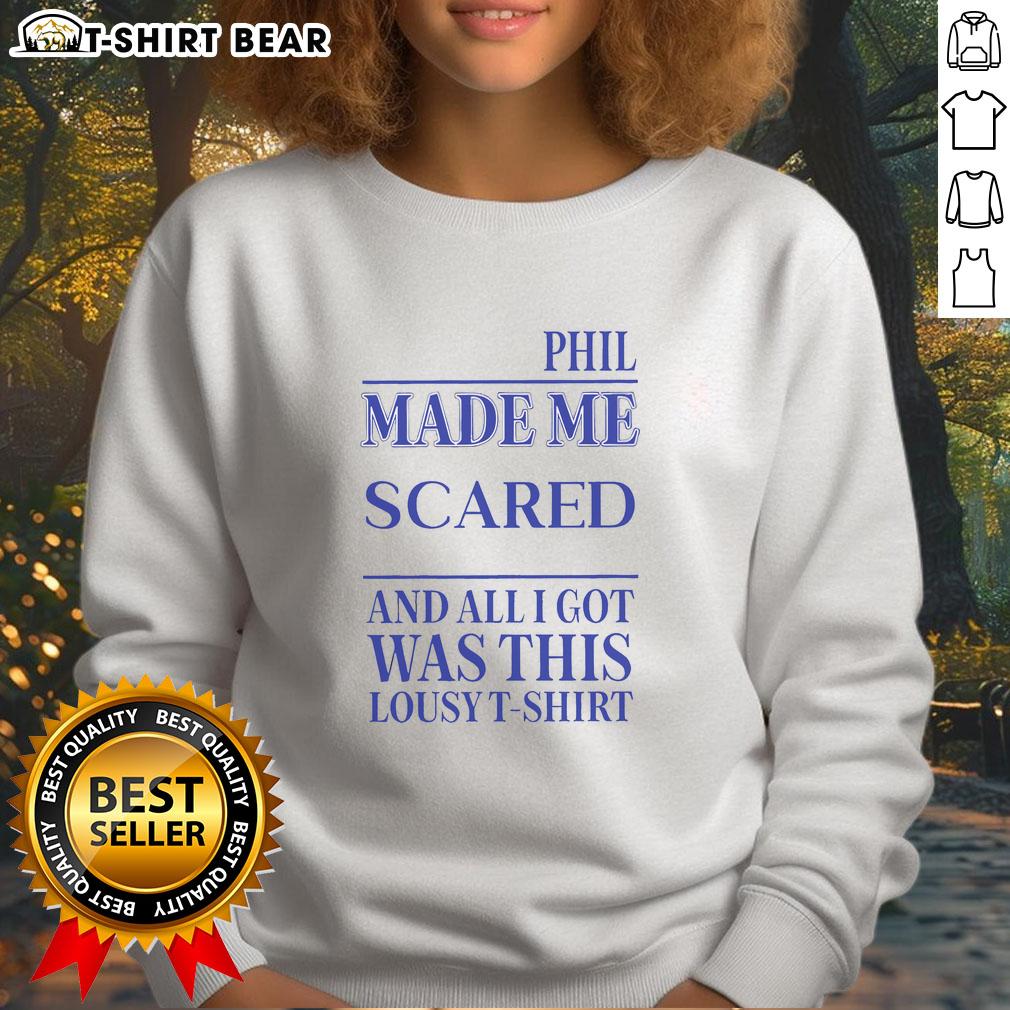 Funny sweatshirt reading 'Official Phil Made Me Gay' showcasing humor and pride in LGBTQ+ identity.