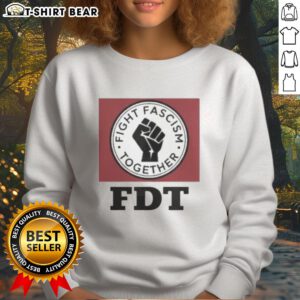 Alt Text: Original Fight Fascism Together FDT Sweatshirt featuring bold lettering and a stylish design for activism.