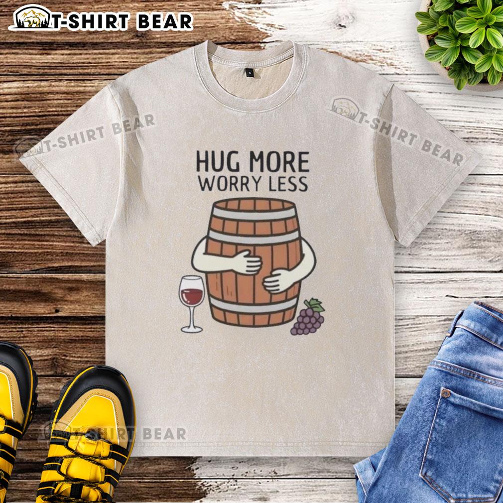 Original Hug Wine Barrel 'More Worry Less' washed t-shirt displayed on a wooden background, perfect for wine lovers.