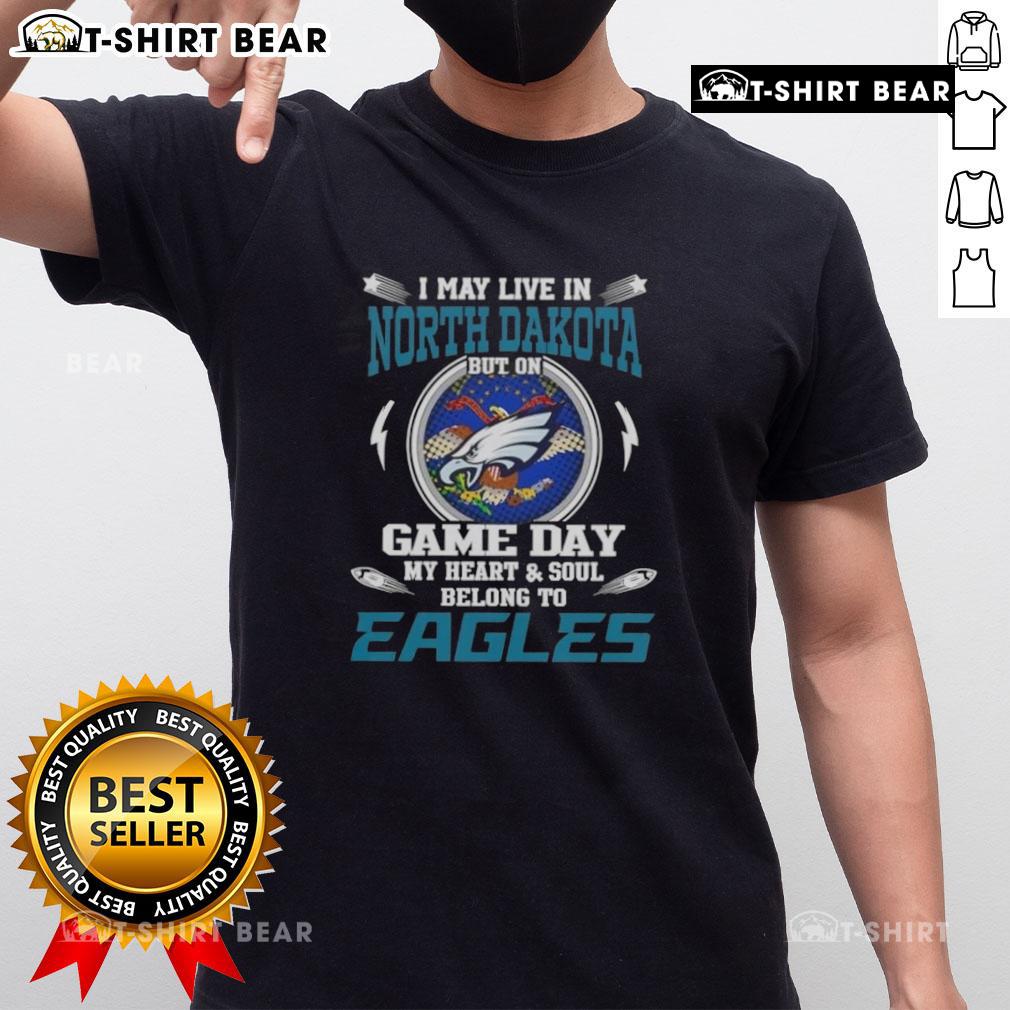 Alt Text: Original I May Live In North Dakota But On Game Day My Heart And Soul Belongs To Philadelphia Eagles T-Shirt design.