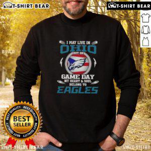 Alt Text: Cozy sweatshirt reading 'I may live in Ohio but on game day my heart belongs to Philadelphia Eagles' in green.
