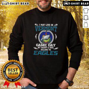 Alt Text: Cozy sweatshirt featuring I May Live In Vermont, But On Game Day My Heart Belongs To Philadelphia Eagles design.