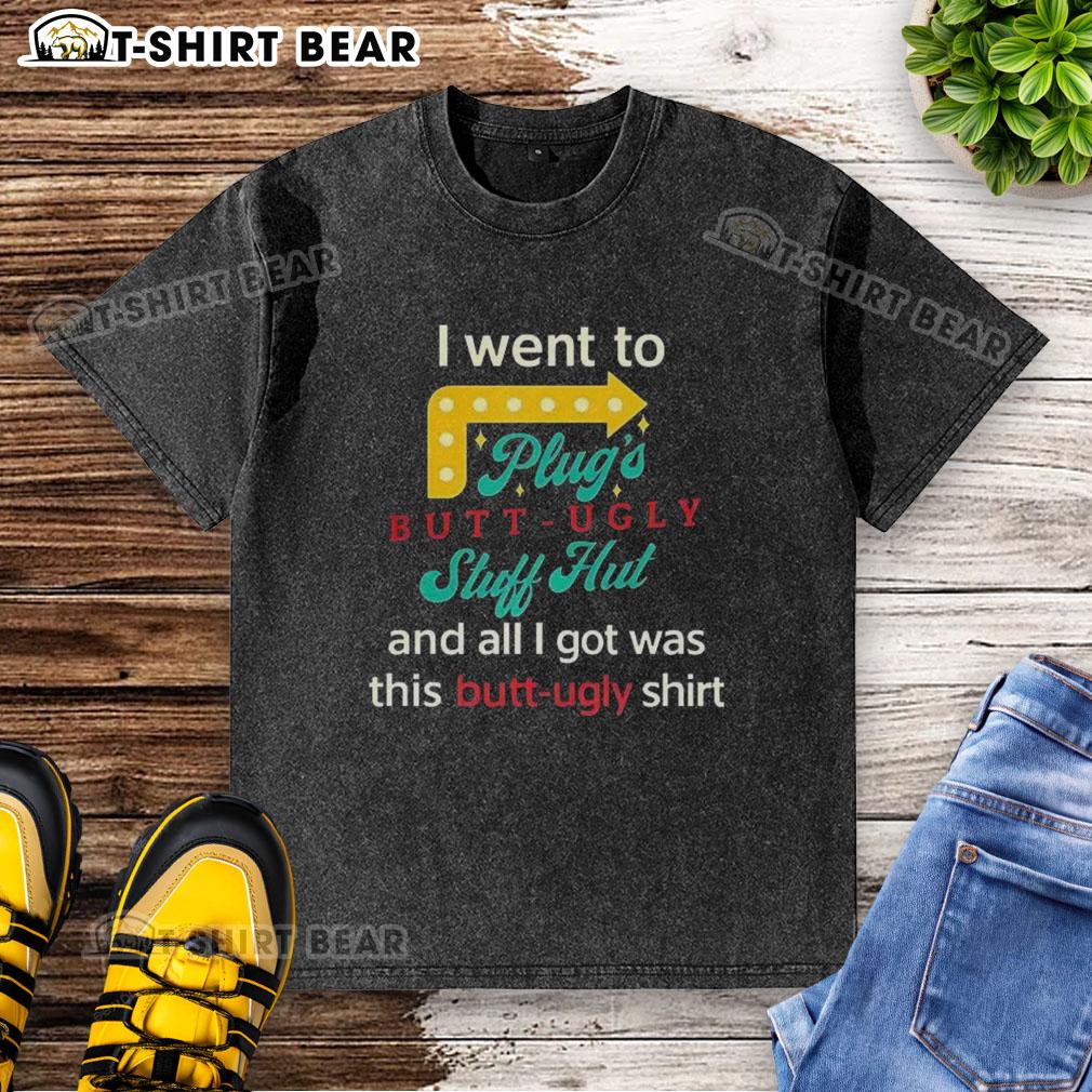 Alt Text: Original I Went To Plugs Butt Ugly Stuff Hut Washed T-Shirt design featuring quirky graphics and vibrant colors.