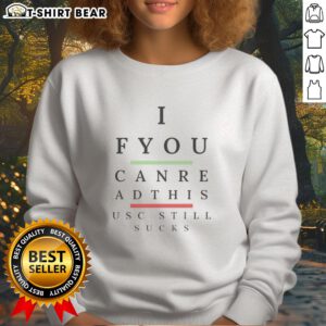 Alt Text: Original 'If You Can Read This USC Still Sucks' sweatshirt featuring bold text on a cozy fabric.