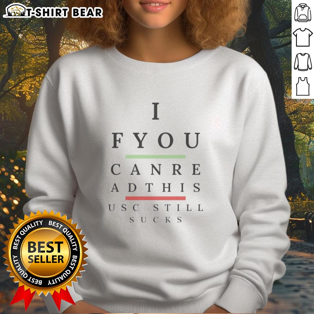 Alt Text: Original 'If You Can Read This USC Still Sucks' sweatshirt featuring bold text on a cozy fabric.