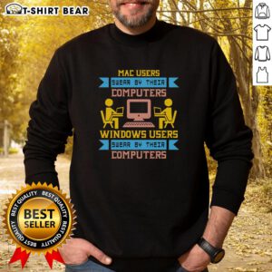 Premium Mac users and Windows users sweatshirt featuring a playful design celebrating computer loyalty.
