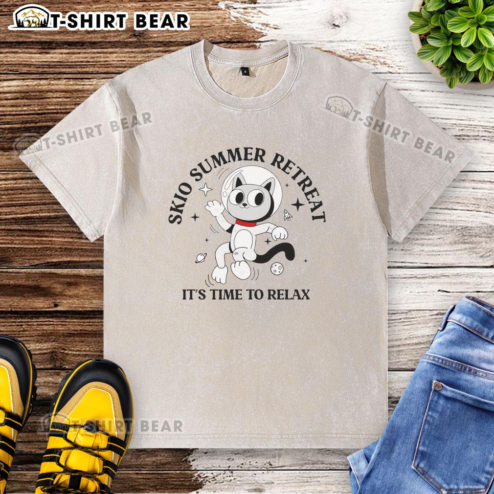 Pretty Skio Summer Retreat 'It's Time to Relax' washed t-shirt displayed on a sunny outdoor setting, perfect for summer vibes.