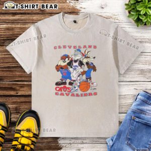 Alt Text: Cleveland Cavaliers NBA x Looney Tunes cartoon characters graphic on a washed t-shirt for fans and collectors.