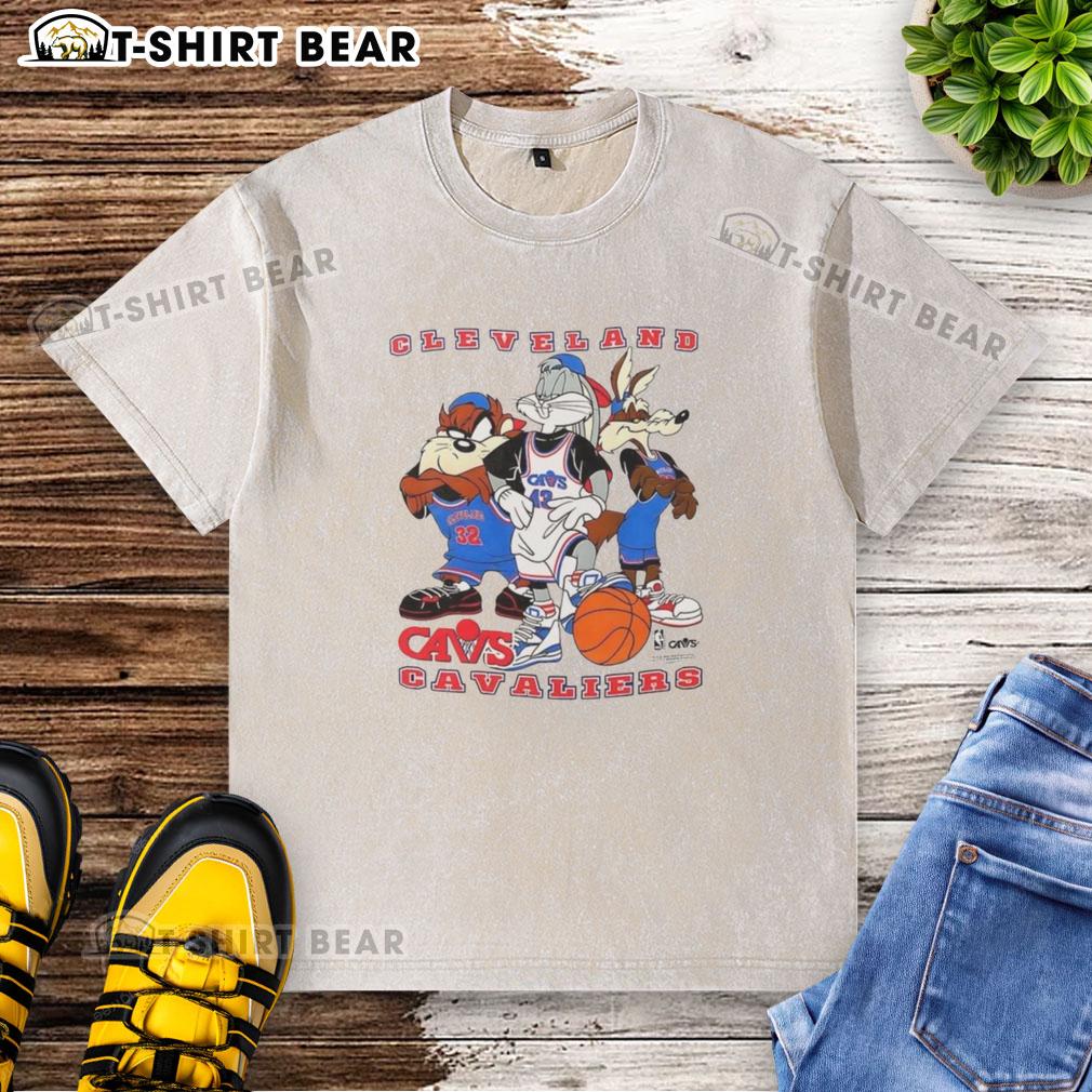 Alt Text: Cleveland Cavaliers NBA x Looney Tunes cartoon characters graphic on a washed t-shirt for fans and collectors.