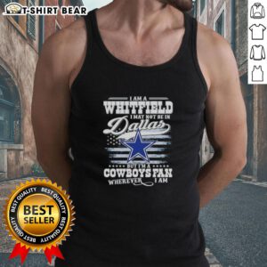 Person wearing 'I May Not Be in Dallas But I'm a Cowboys Fan Wherever I Am' tank top, showcasing team spirit.