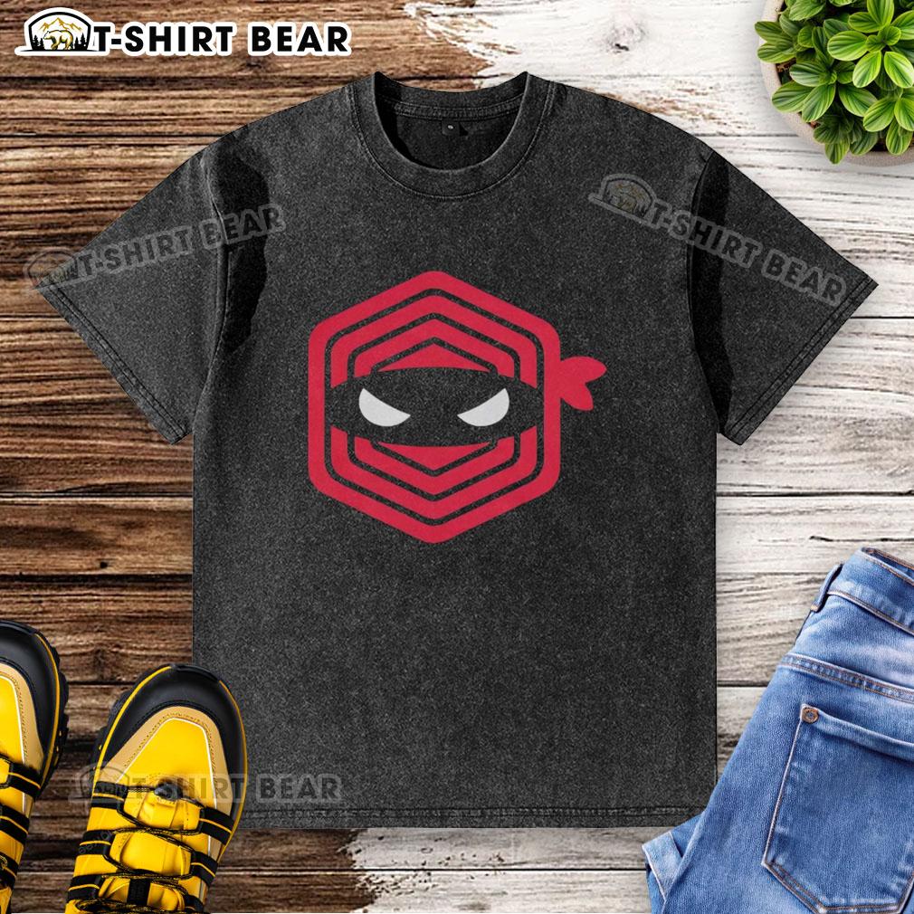 Alt Text: Cleveland Guardians baseball washed t-shirt featuring a top pitching ninja design for fans and players.