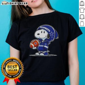 Snoopy in a Dallas Cowboys hoodie smiles at fans on a ladies tee, showcasing awesome peanuts character design.